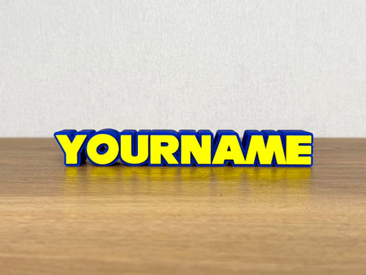 Picture of a sonic the hedgehog video game name sign on a desk or bedroom table