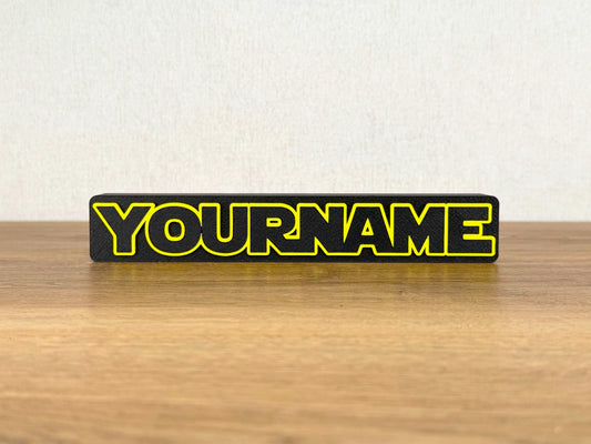 Picture of a star wars name sign on a desk or bedroom table